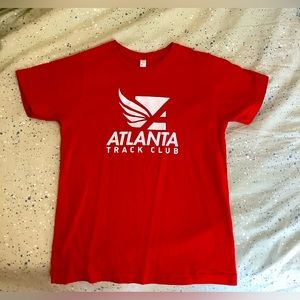 Atlanta track club red shirt, large in youth